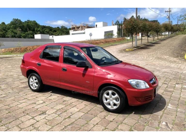 CHEVROLET - PRISMA - 2010/2010 - Vermelha - R$ 27.800,00